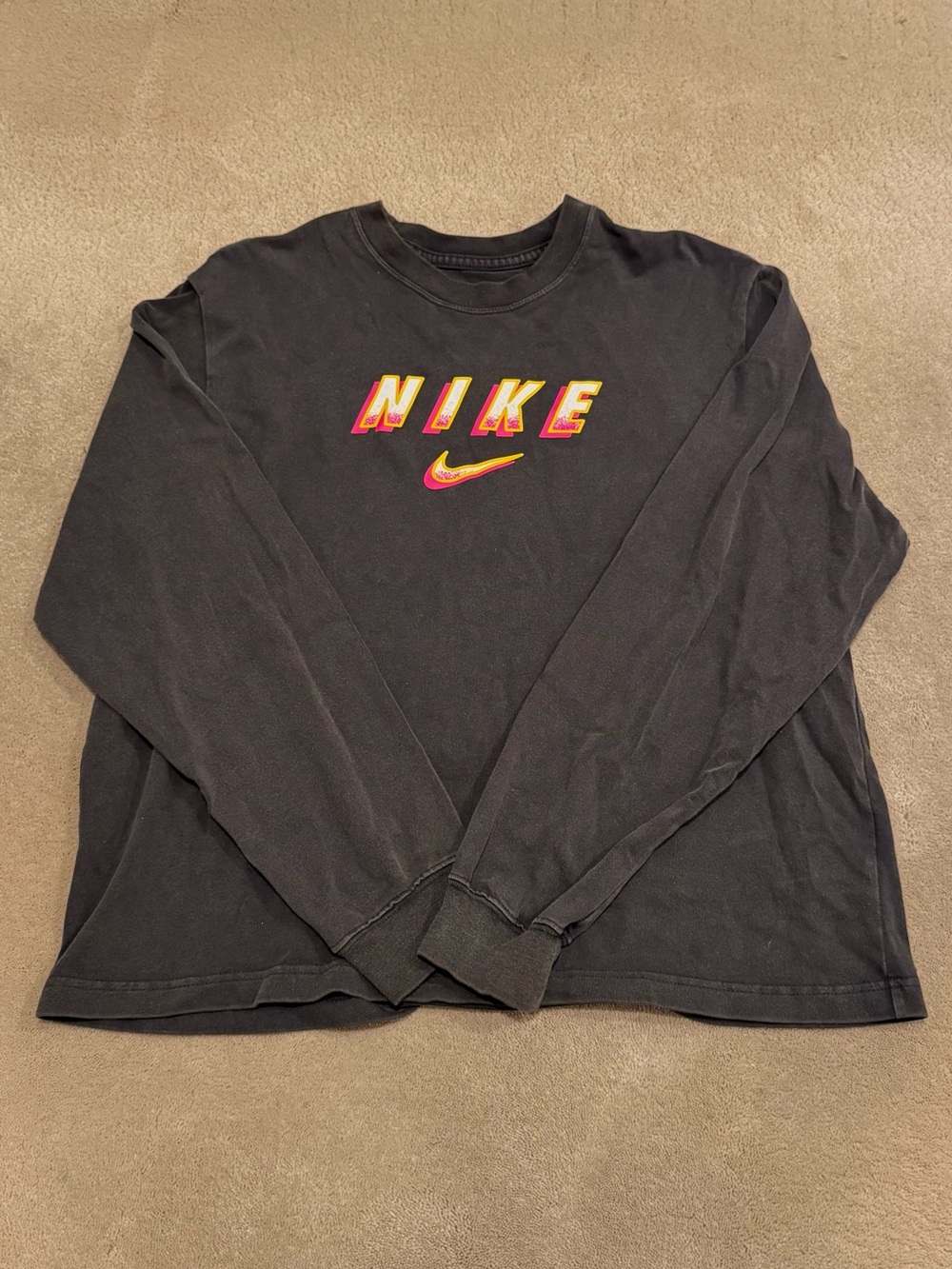 Nike Women’s Loose Fit Long Sleeve Logo Top in Black